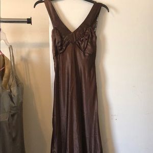 Brown satin gown with ruching and sweep train